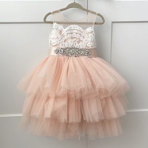 Stunning peach pink tulle toddler dress with sash, lace and pearl buttons. 2T